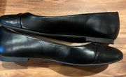 black faux leather flats embossed logo round toe 9 TWGAHVI SS