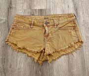 mustard ripped jean shorts size 25