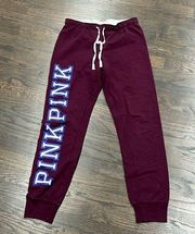 Pink Victoria’s Secret burgundy sweatpants