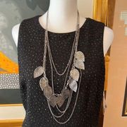 Beautiful silver colored multi strand necklace w/ leaves great statement piece