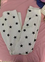 white bell bottoms with black stars