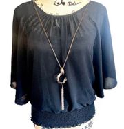 NWOT- Black Sheer Crossover Medallion Overlay Top