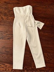 Black Halo Harbor Strapless Tapered Leg Jumpsuit with Side Bow in White Size 4