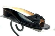 Ferragamo Black patent leather slides with bow