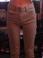 tan high waisted American eagle skinny jeans 