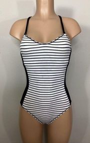 New. Robin Piccone black stripe one piece. Size 4. Retails $178