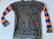 Casa Lee comic long sleeve tee with striped arms. Size L