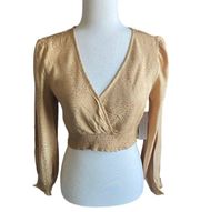 NWT- LOS ANGELES-SIZE SMALL Gorgeous gold color crop top, elastic bottom, v neck, open back, long sleeves, size small Measurements: Bust: armpit to armpit 15 inches  Length: shoulder seam to bottom 15 inches