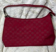 DKNY red monogram purse. Shoulder bag. Some cracking on inside of strap