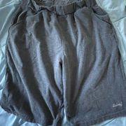 Woman’s  gray Bermuda long shorts