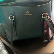 Nanette Lepore dark green handbag with little floral handkerchief on front. EUC