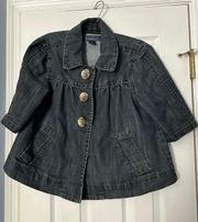 denim short sleeve jacket is a size Medium.