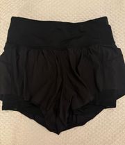 size 2 high waisted limited edition flowey shorts with spandex under