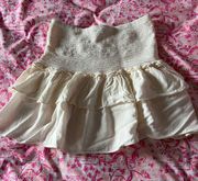 cream  ruffle mini skirt