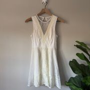 White Lace Mini Dress Sleeveless Lined Zipper Button Sheer Neck 0