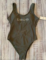 bebe Olive Low Back One Piece Swimsuit. Size Small. NWT