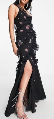 ruffle maxi dress with floral embellishment in black