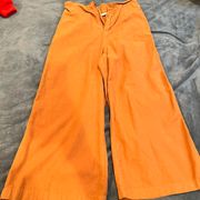 Boutique burnt orange flared pants  Size small  Stretchy/ super comfy  Color is like a burnt orange/brown 
