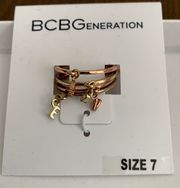 BCBGeneration Brand New  2-tone Four Bands Ring