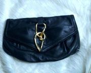 Sondra Roberts black leather clutch/purse bag.