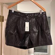 NWT black faux leather shorts. Size L