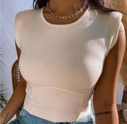 Brand new with tags  cream cropped shoulder padded top size large