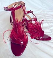 Brand New  Red patent Heel with Feathers Size 6.