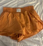 Light Orange offline  shorts, with spandex underneath