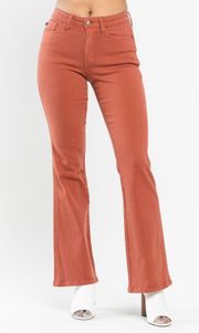 Terracotta Boot Cut Flare Jeans in Rusty Orange size 7/28 Mid Rise