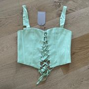 Meshki Scarlet Satin Corset top in Pistachio Green