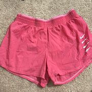 Pink Nike shorts