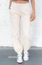 Brandy Melville rosa sweatpants off white