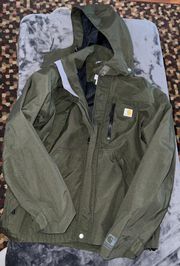 Carhartt Storm Defender Loose Fit Heavyweight Jacket In Moss