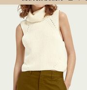 Sleeveless, knitted turtle neck top worn once like new sold out on brand’s site