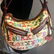 Like New, Auth Dooney and Bourke Circle Hobo Doodle Collection of 2006 rainbow