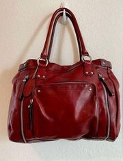 Wilson’s red leather oversized tote/travel bag