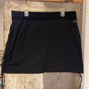 Columbia skort 1X. Black with pockets and ties on side