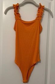 Vestique Orange Bodysuit