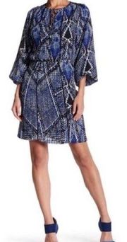 Parker v-neck front tie dress with all over print . Size medium