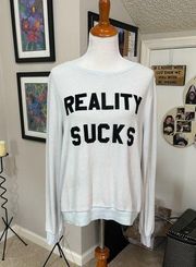 Wildfox Light Blue sweatshirt, size Medium. "Reality Sucks"