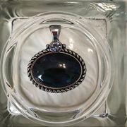 Lia Sophia pendant silver tone setting with blue oval shaped stone
