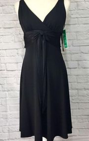 New black v neck dress by Maggy L in size 6 sleeveless midi Little Black Dress