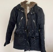 black leather coat with fur hood