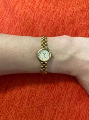 Woman’s sappire crystal gold plate stainless steel WR  Watch!