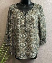 ROZ&ALI A size small pinto three-quarter sleeve pop over blouse.