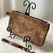 Large embossed leather wristlet. One of a kind statement piece!