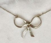 Juicy Couture Etched Silver Bow Necklace