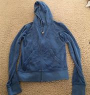 Blue zip up never worn jacket with print