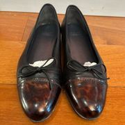 Stuart Weitzman Sleek Cap Toe Bow Flat Patent Toe with black leather size 7.5