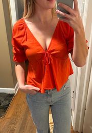 Orange Peplum Top